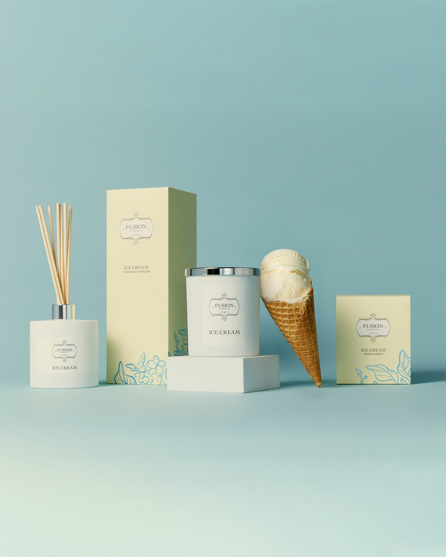 A colourful display of products featuring ice cream cones, scented candles, fragrant diffusers and decorative packaging box.